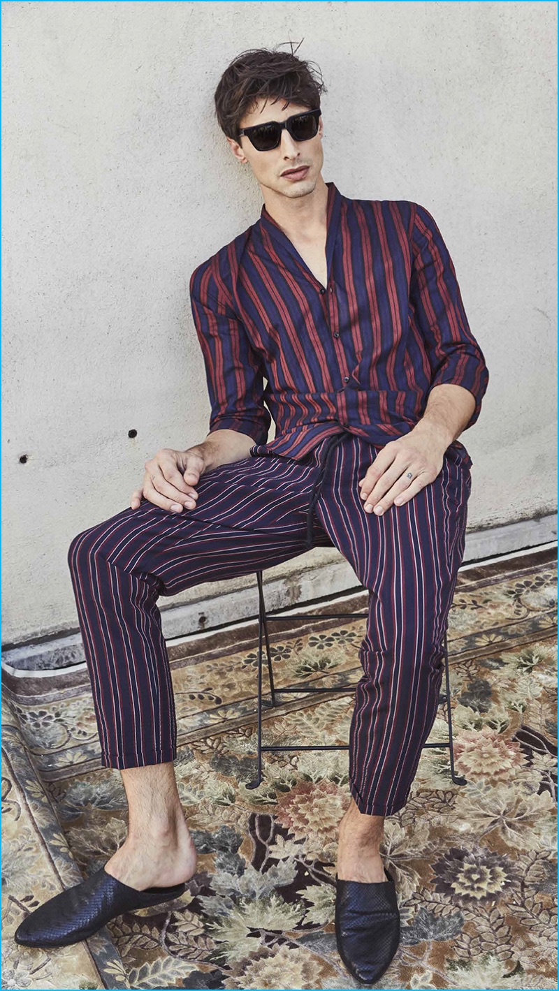 Mixing stripes, Jonas Mason models a pajama inspired number from The Kooples' spring-summer 2017 collection.