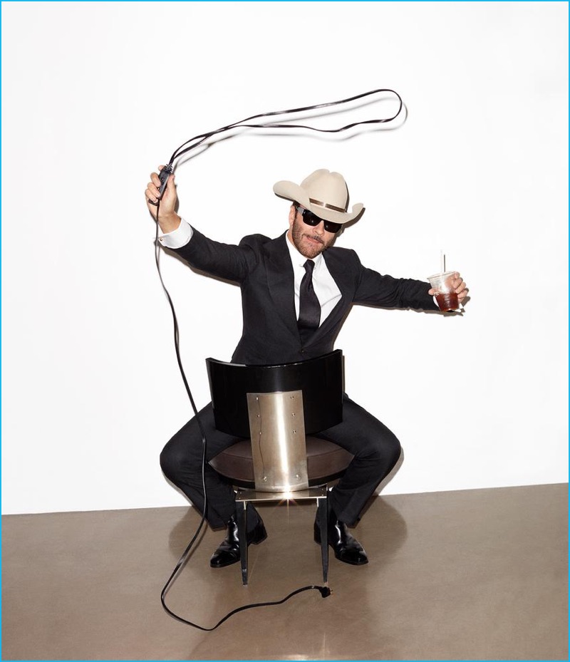 Designer and director, Tom Ford dons a cowboy hat and one of his signature suits for WSJ magazine.
