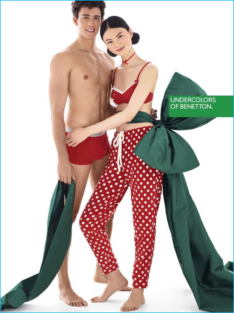 Models He Cong and Xavier Serrano star in Undercolors of Benetton's holiday 2016 campaign.