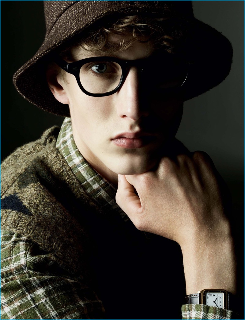 Ellis Kennedy is geek chic in a Polo Ralph Lauren shirt and v-neck sweater. The model also wears a vintage wool hat and Moscot glasses.