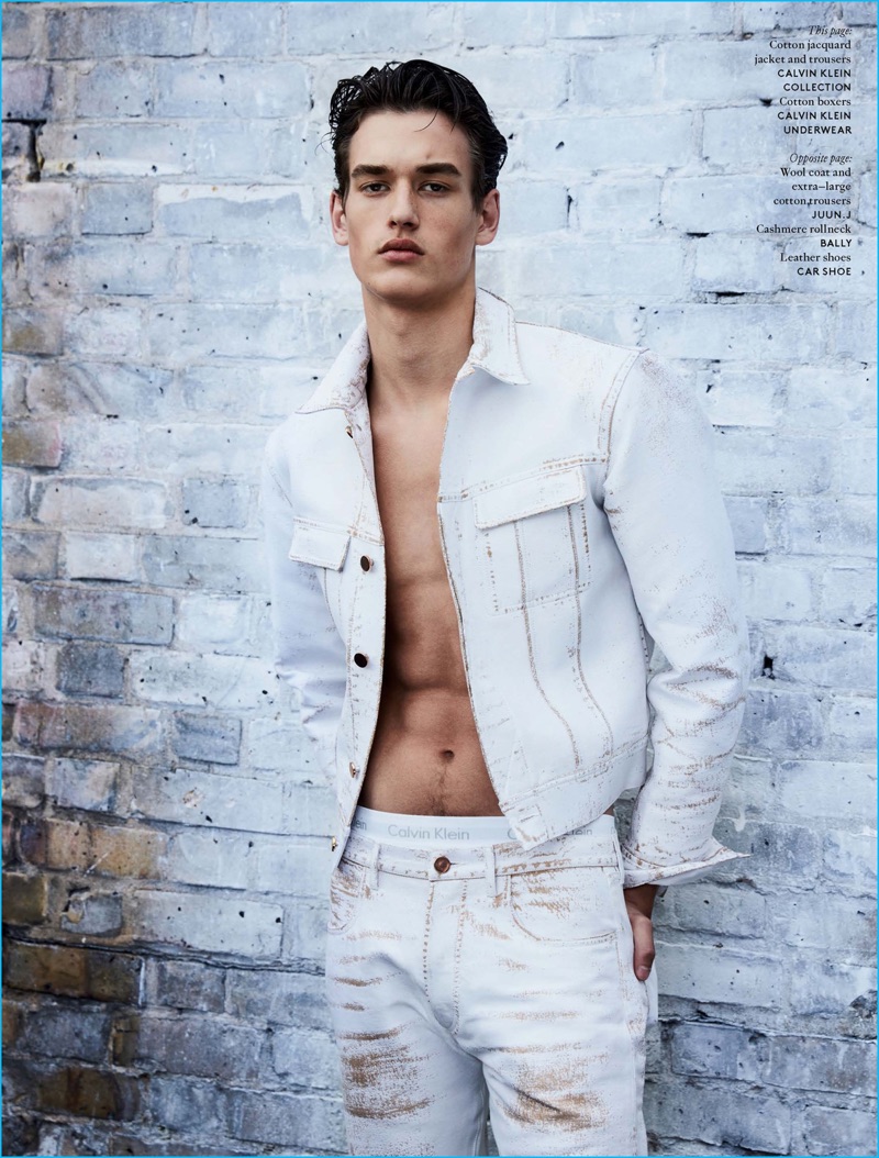 Jegor Venned sports a jacquard denim jacket and pants by Calvin Klein Collection with Calvin Klein underwear.
