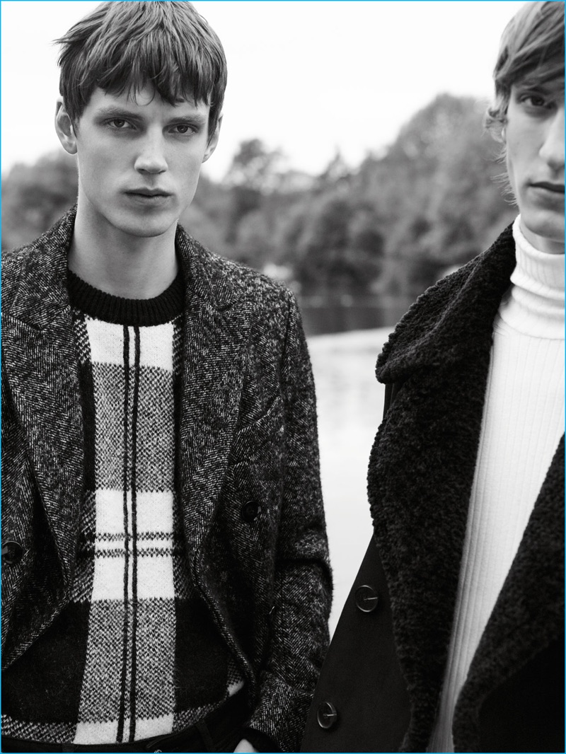 Left to Right: Callum Ward wears a herringbone coat with a check sweater. Tim Dibble sports a double-faced coat with a turtleneck sweater by Zara Man.