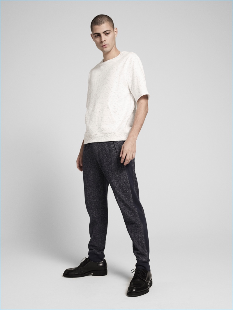 Front and center, Micky Ayoub dons a short-sleeve sweatshirt and joggers from ATM's pre-fall 2017 collection.