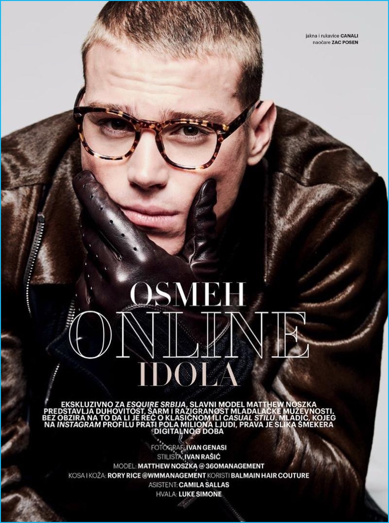 Model Matthew Noszka dons a jacket and leather gloves by Canali with Zac Posen tortoiseshell glasses.