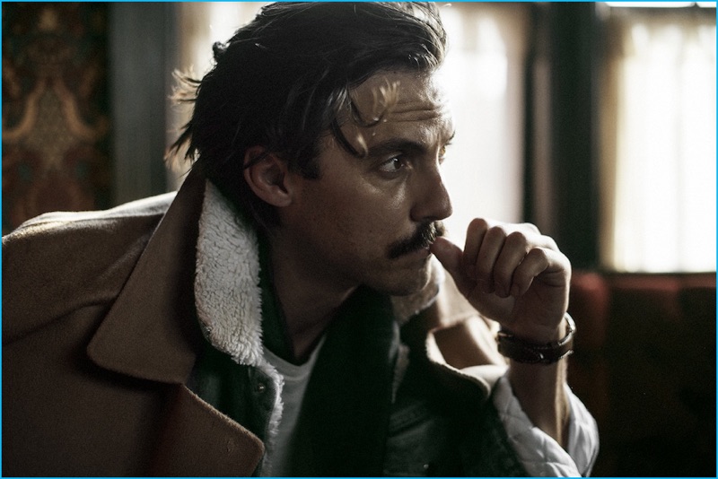 Actor Milo Ventimiglia sports a Sandro coat and jacket with an IRO t-shirt and Shinola watch.