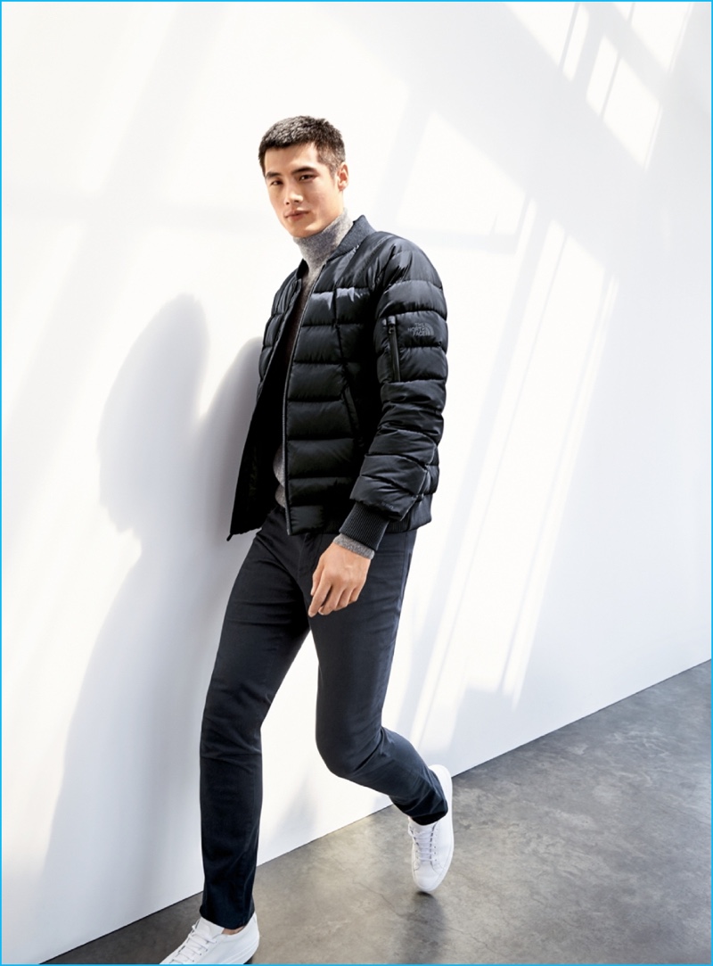 Hao Yun Xiang dons a quilted bomber jacket by The North Face with a Nordstrom Men's Shop cashmere sweater, and Vince straight-leg pants.