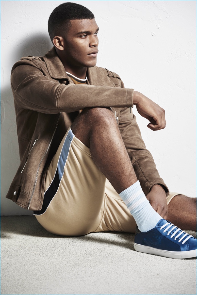 A suede jacket collides with sporty shorts for River Island's spring-summer 2017 collection.