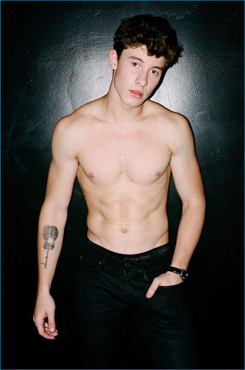 Brad Elterman photographs a shirtless Shawn Mendes in black GUESS jeans and Calvin Klein underwear for Flaunt.