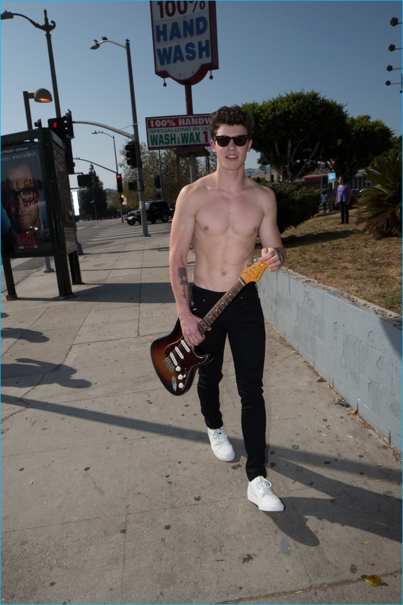 A shirtless Shawn Mendes takes to the streets of Los Angeles with Flaunt in GUESS jeans and Calvin Klein underwear.