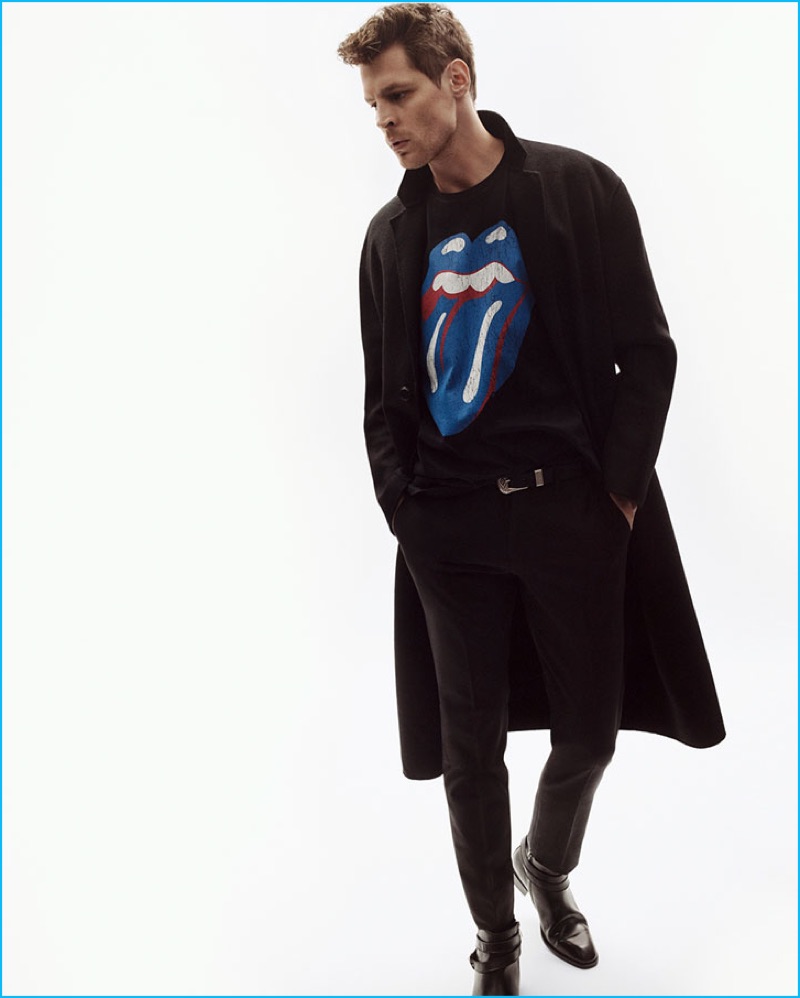 Model Adrian Wlodarski sports a printed sweatshirt from Zara's The Rolling Stones capsule collection.