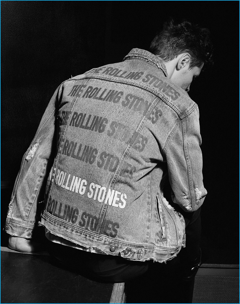 Leading model Adrian Wlodarski sports a denim jacket from Zara's The Rolling Stones capsule collection.