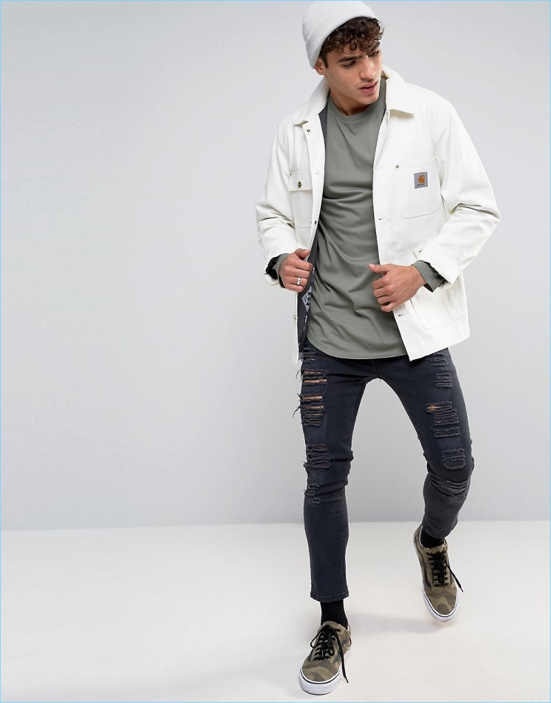 ASOS styles its longline tee with a shirt jacket and ripped black denim jeans.