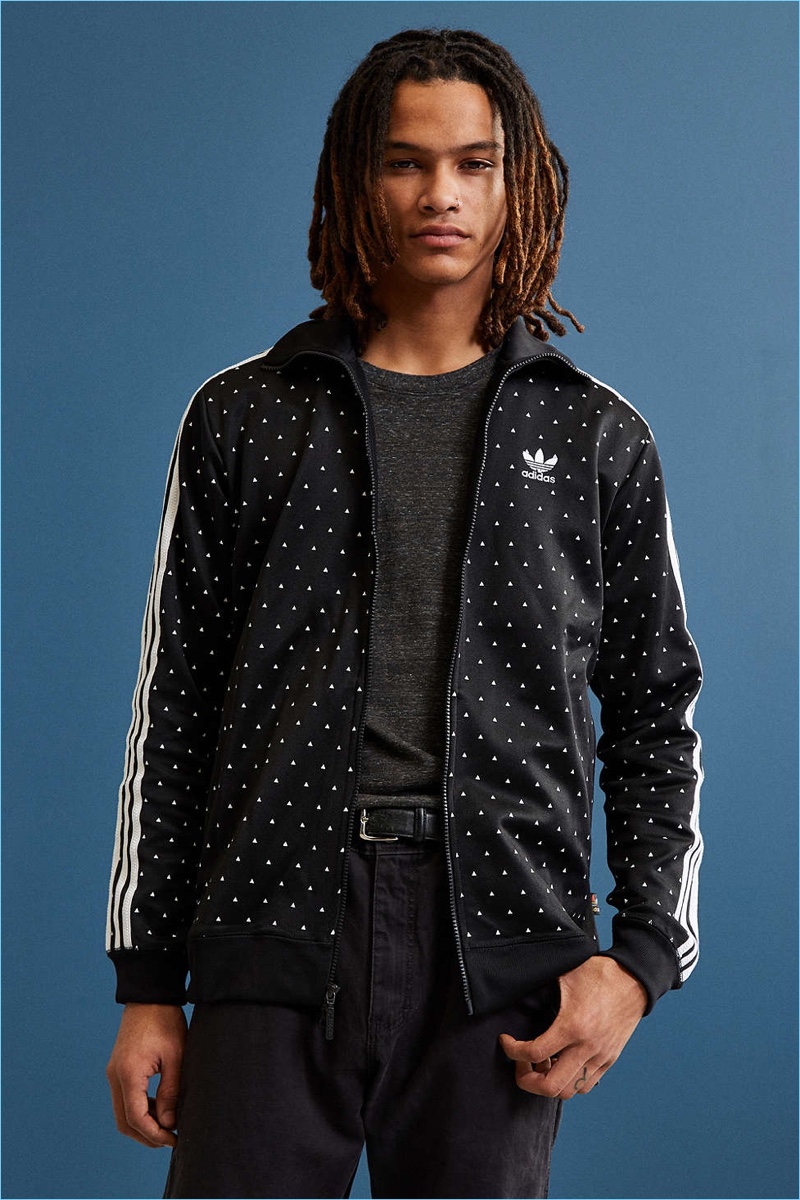 Adidas collaborates with singer and designer Pharrell Williams on a special triangle print men's track jacket.