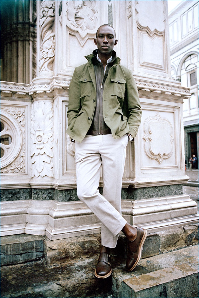 Armando Cabral dons a linen military-style blazer over a leather jacket with chinos by Massimo Dutti.