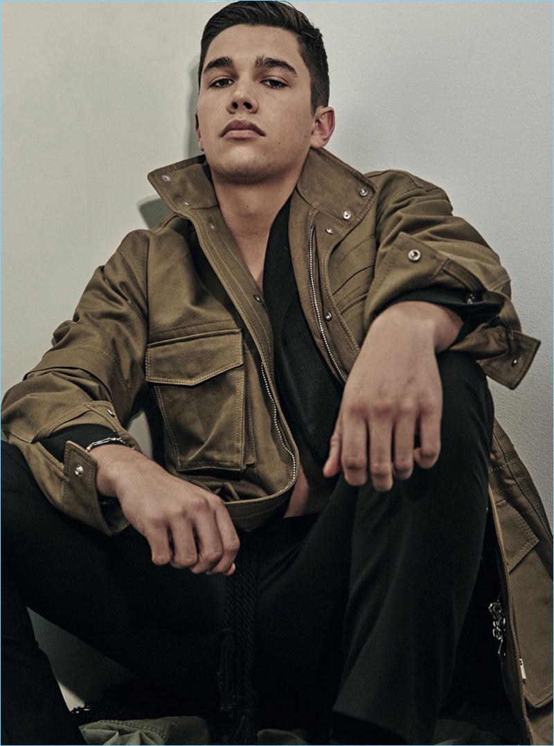 Appearing in a photo shoot for L'Uomo Vogue, Austin Mahone taps into the military style trend.