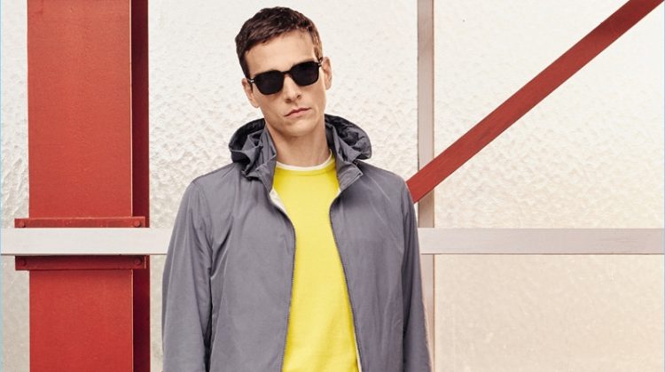 Alexandre Cunha wears a yellow and grey leisure outfit from BOSS Hugo Boss' spring-summer 2017 travel line.