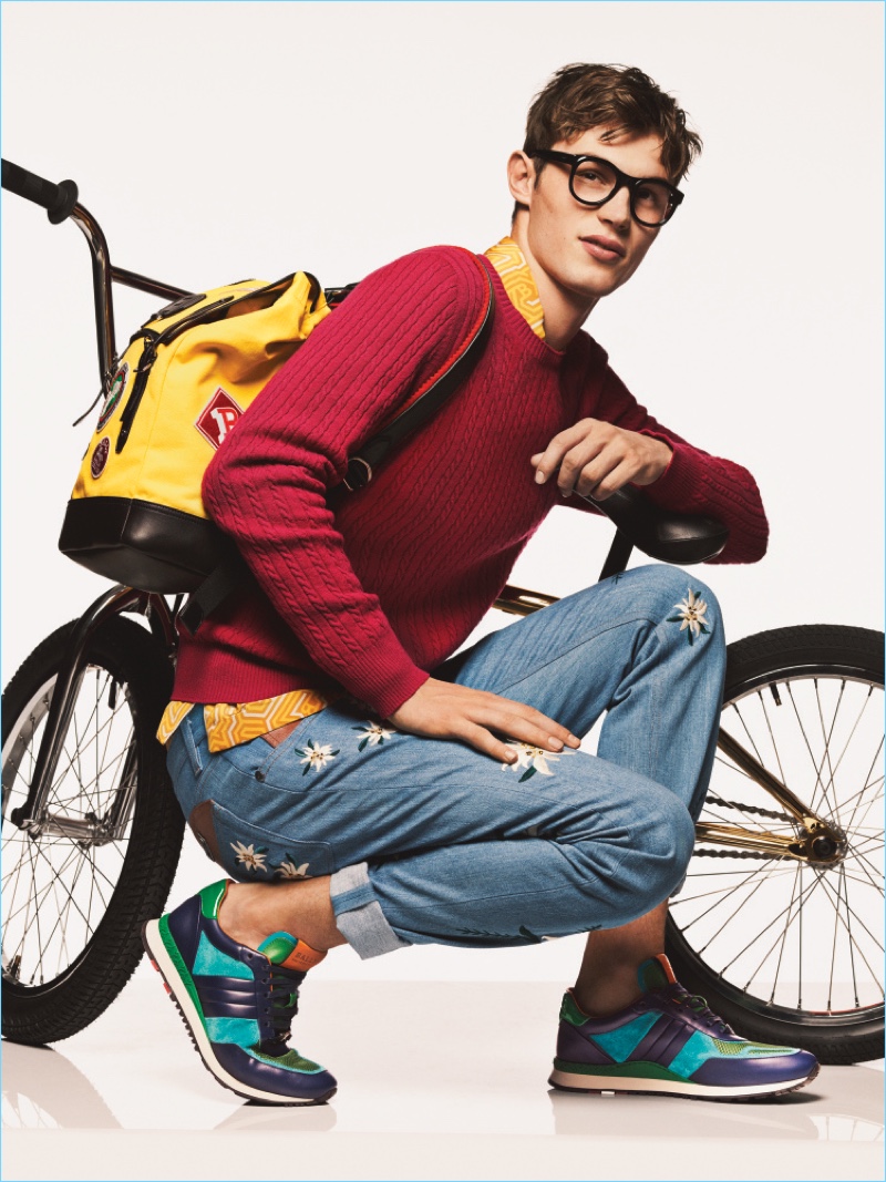 Kit Butler is geek chic in a pair of glasses and colorful knitwear for Bally's spring-summer 2017 campaign.