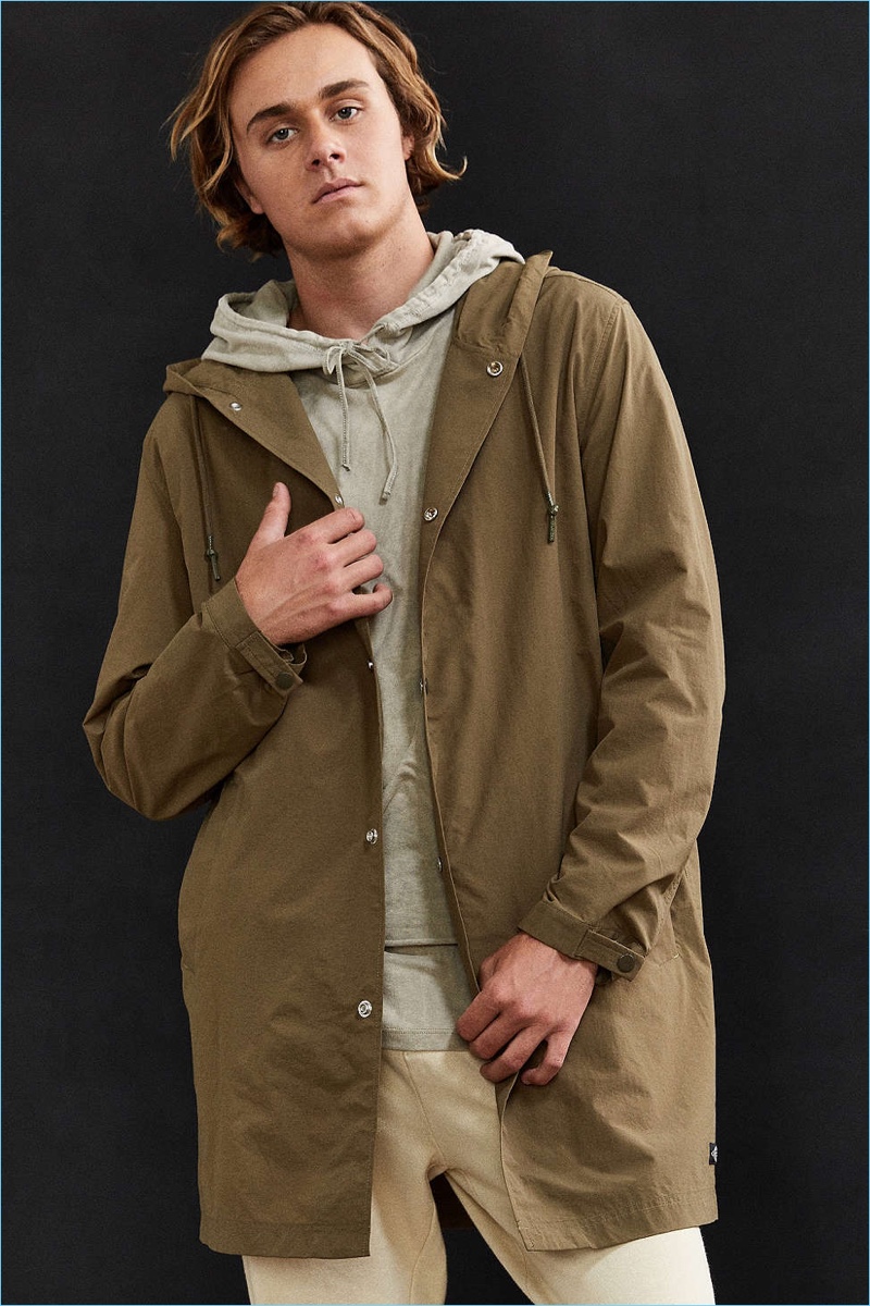 Go casual on a brisk day with CPO's hooded long parka jacket.