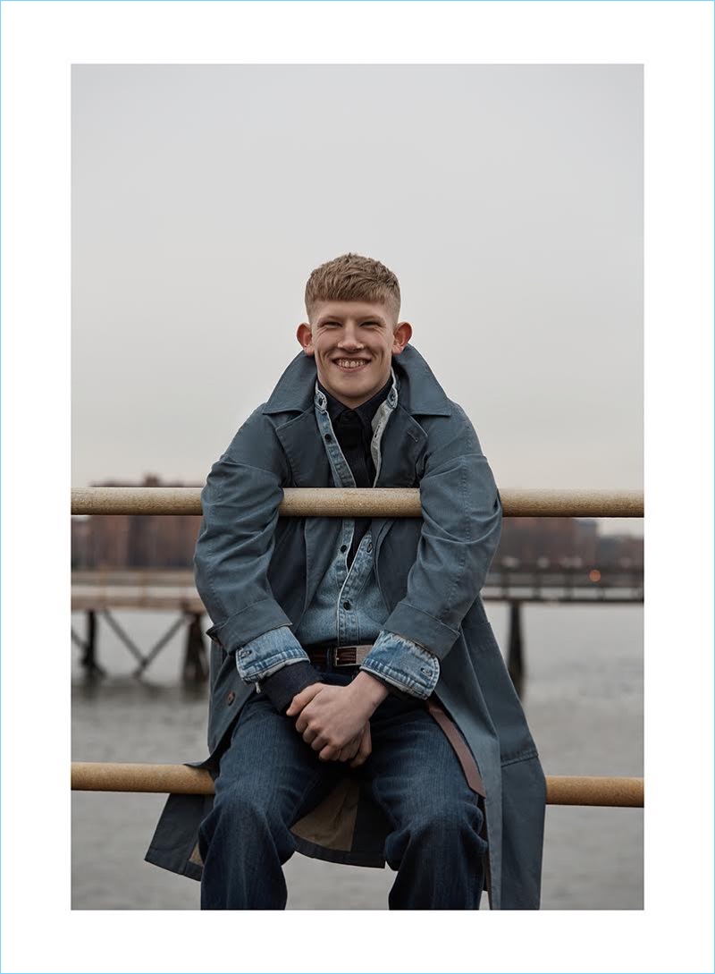 All smiles, Connor Newall is  clad in denim for Summerwinter Homme.