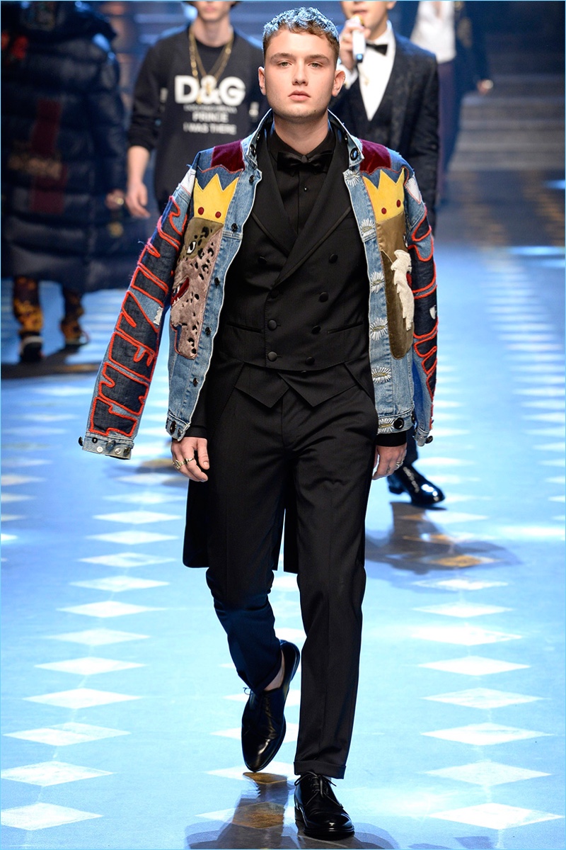 Rafferty Law models a patchwork denim over a tailored look from Dolce & Gabbana's fall-winter 2017 men's collection.
