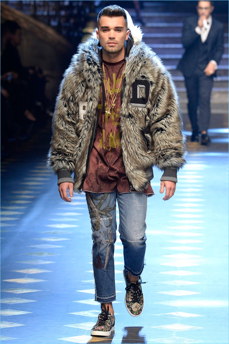 Josh Cuthbert rocks a fur jacket from Dolce & Gabbana's fall-winter 2017 collection.