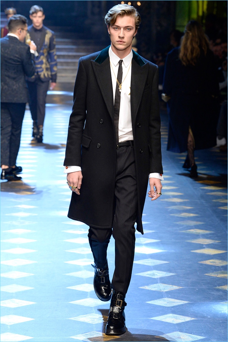 Lucky Blue Smith wears a sleek black and white look from Dolce & Gabbana.
