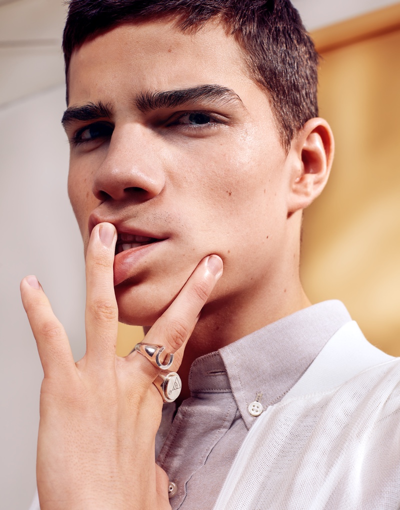 Daan wears shirt A Days March, jacket Weekday, and rings O.P. Jewelry.