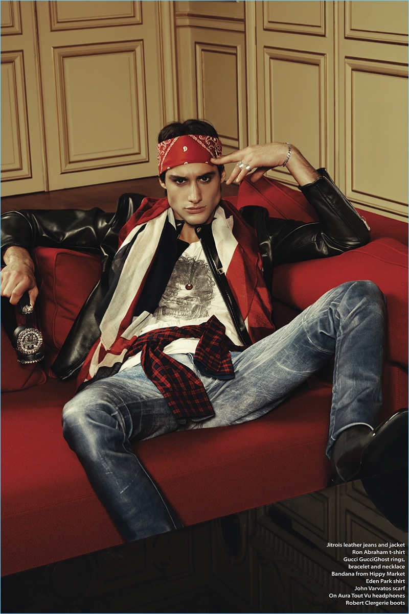 Tapping into a rock inspired edge, Felix Cordier lounges in a Jitrois leather jacket and jeans. Felix completes his look with a John Varvatos scarf, Ron Abraham t-shirt, Eden Park shirt, and Robert Clergerie boots.