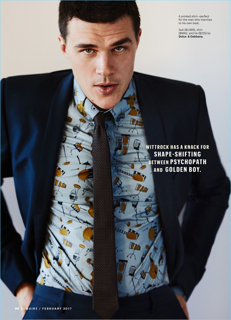 Front and center, Finn Wittrock sports a suit with a skinny tie and print shirt by Dolce & Gabbana.