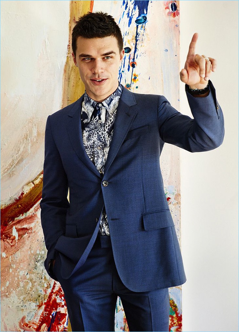 Actor Finn Wittrock sports a Louis Vuitton suit and graphic shirt for Esquire.