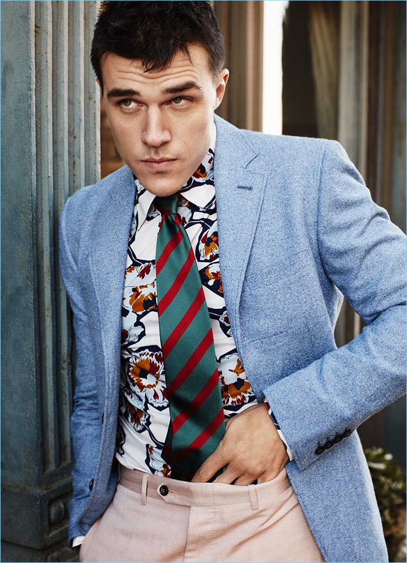Finn Wittrock wears a Canali suit with a printed Marni shirt and Drake's tie.