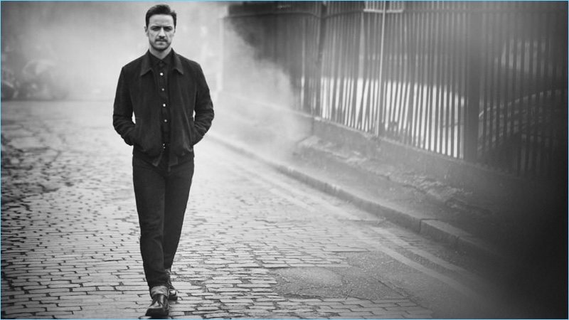 Boo George photographs James McAvoy in a Brunello Cucinelli suede jacket, Ermenegildo Zegna denim jeans, and Brunello Cucinelli derby shoes.