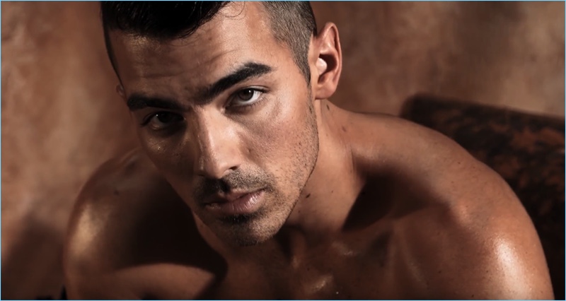 Shooting the GUESS Underwear campaign, Joe Jonas appears before the lens of photographer, Yu Tsai.