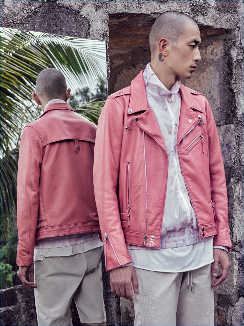 Sung Jin Park rocks John Elliott's statement pink leather biker jacket for spring-summer 2017.