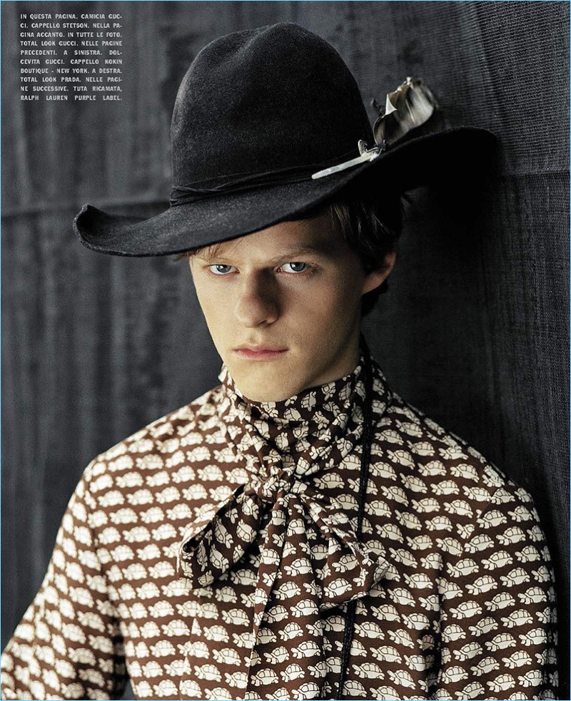 Actor Lucas Hedges dons a Gucci printed shirt with a Stetson hat.