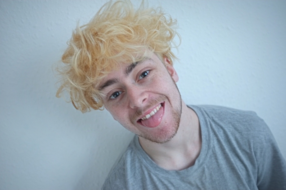 Man Wearing Blond Wig