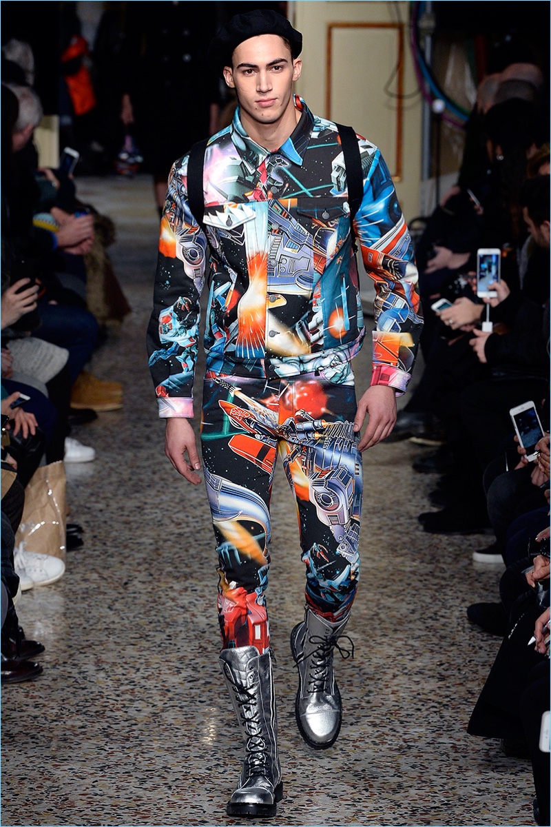 Alessio Pozzi takes to the catwalk in a graphic ensemble featuring an all-over Transformers print.