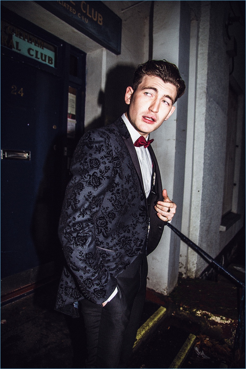 A sharp vision, Dylan Hartigan dons a floral print dinner jacket from Noose & Monkey.