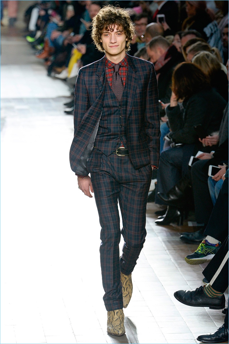 Paul Smith mixes various plaids for a statement fall-winter 2017 suiting look.