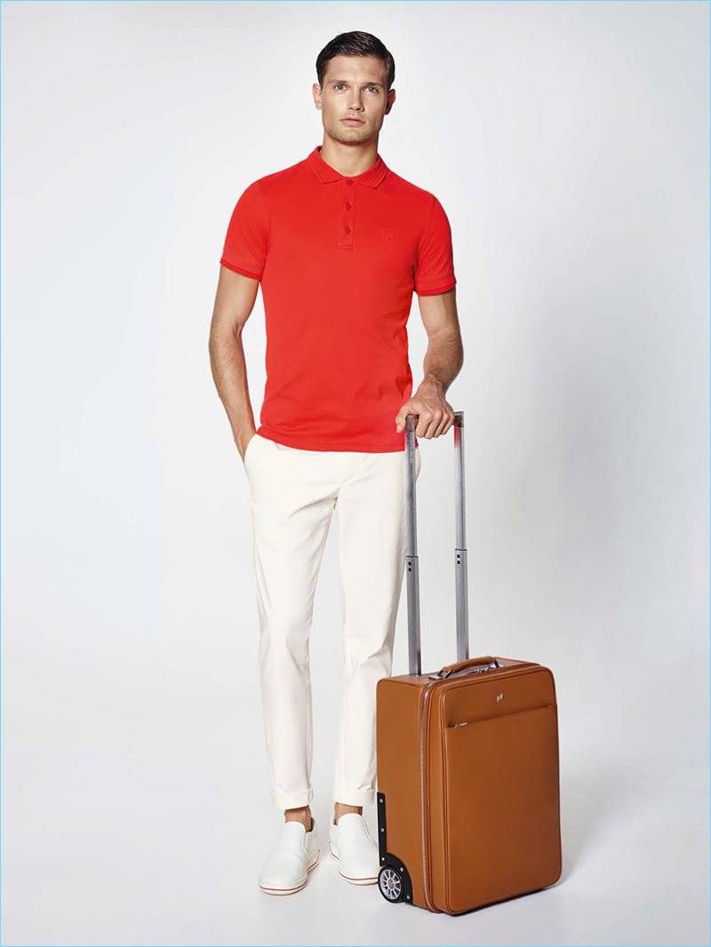 Borrow a chic style note from Porsche Design with a simple ensemble. The brand pairs together a red polo shirt with cotton blend pants and slip-on sneakers.