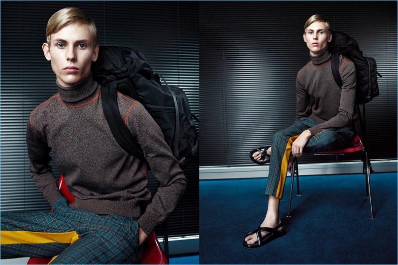 Oliver Houlby models a turtleneck sweater and plaid trousers for Prada's spring-summer 2017 campaign.