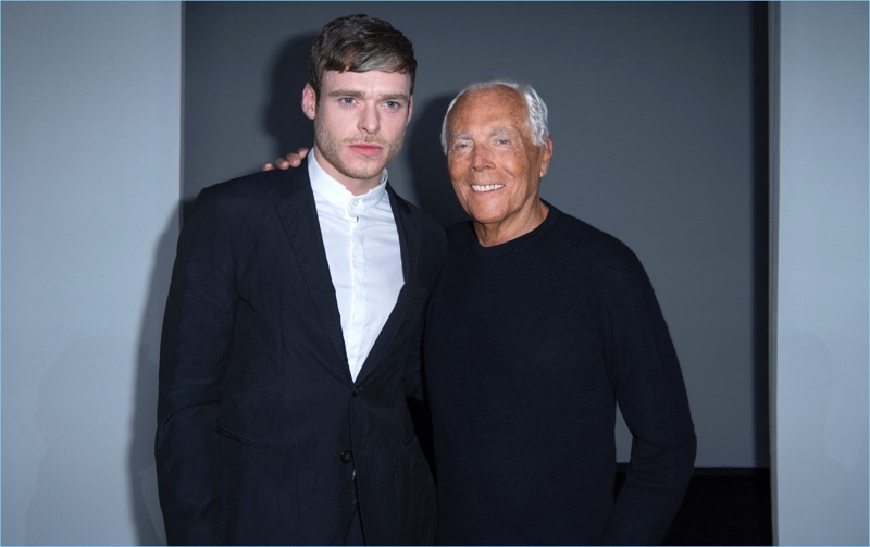 Actor Richard Madden poses for pictures with Giorgio Armani.