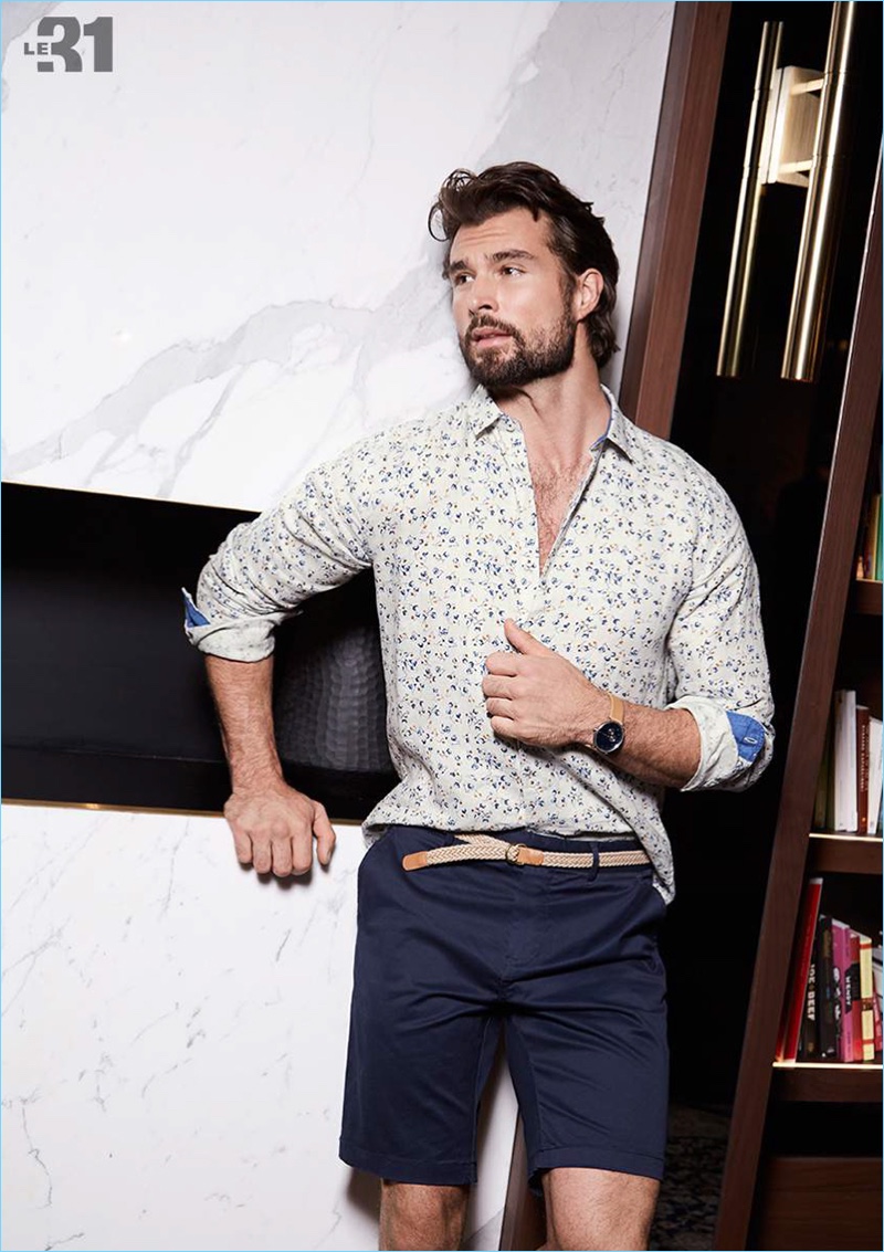 Simons enlists Walter Savage for a casual style update, which includes LE 31's floral print linen shirt and braided belt chino Bermudas. Walter also wears a Skagen watch.