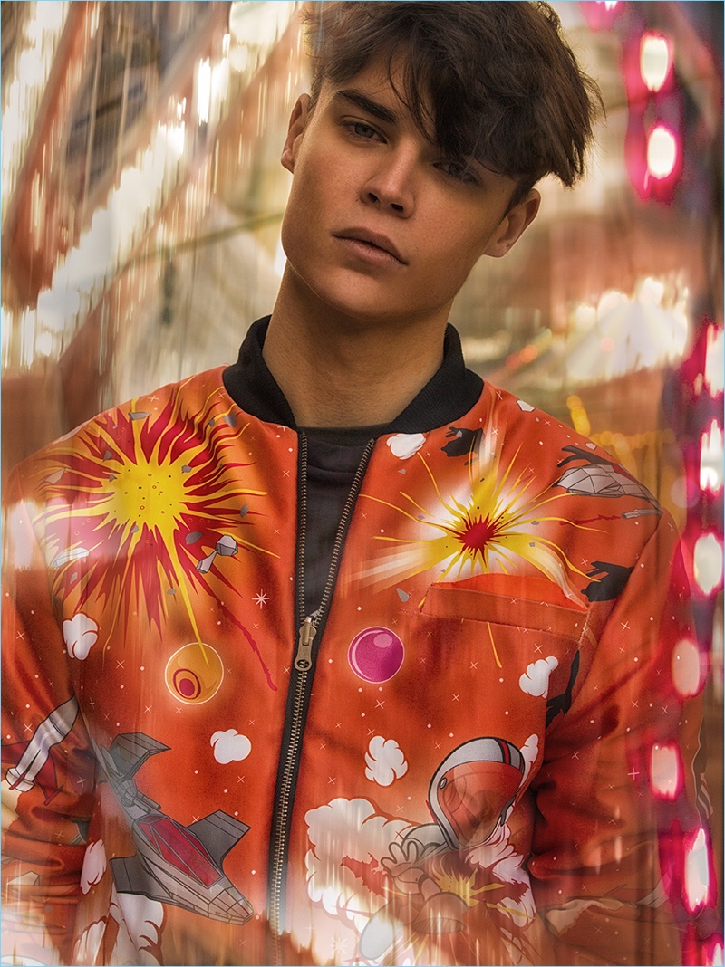 Justin Hagemoser rocks a colorful bomber jacket by TZUJI.