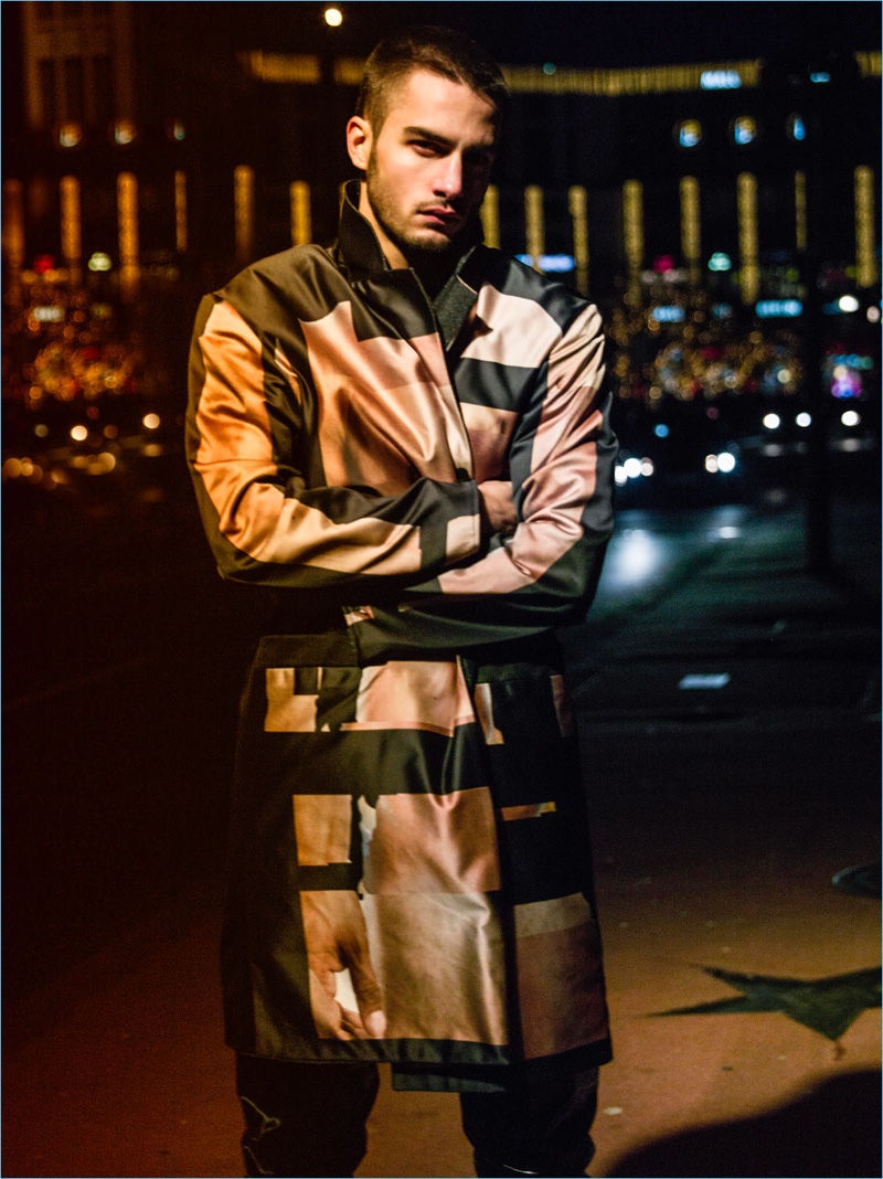 Aleksandar Rusić covers up in a statement coat from TZUJI.