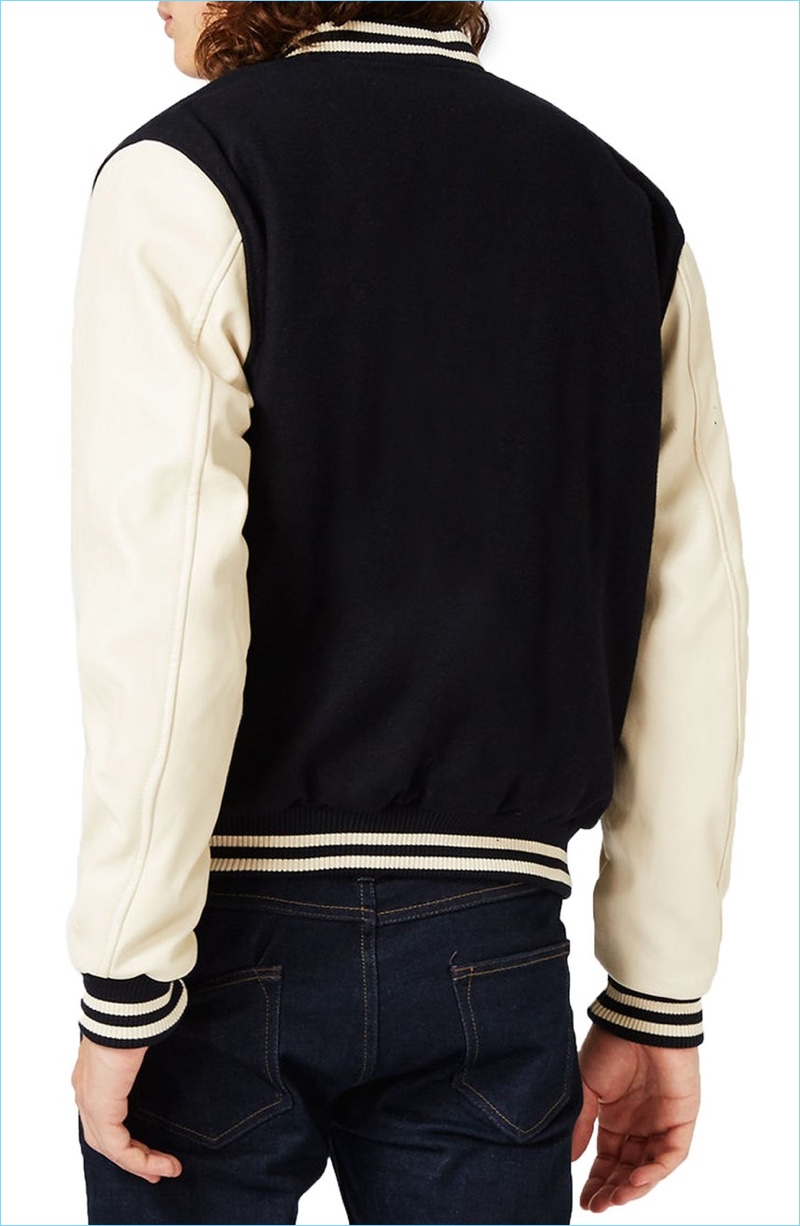 Topman's varsity bomber jacket comes in a smart dark blue and cream color palette.