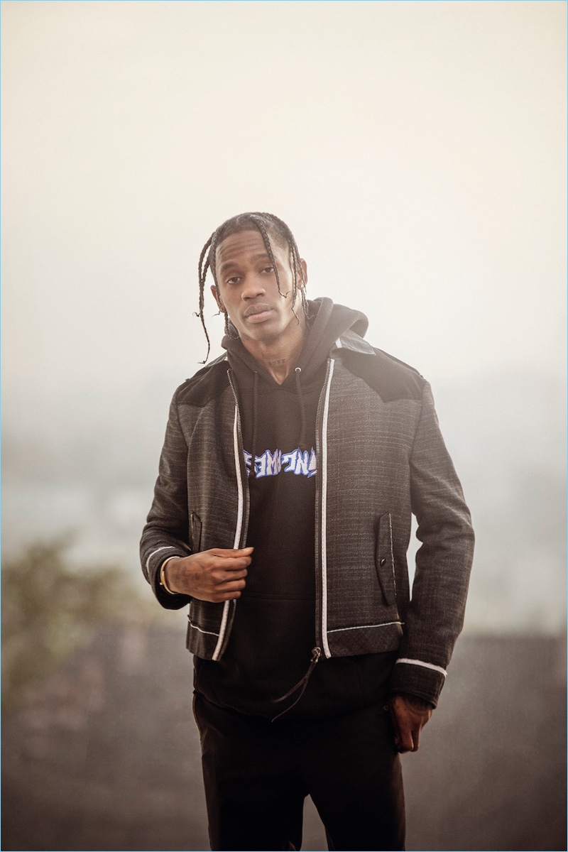 Front and center, Travis Scott sports a Lanvin jacket and trousers with a F**king Awesome sweatshirt.