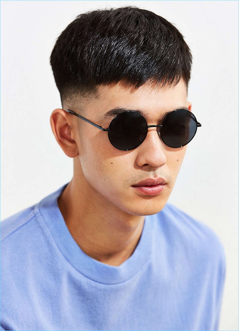 Retro round sunglasses with 100% UV protected lenses. Exposed metal arms with plastic-coated curved tips. Finished with slip-proof silicone nose guards. Only at UO.