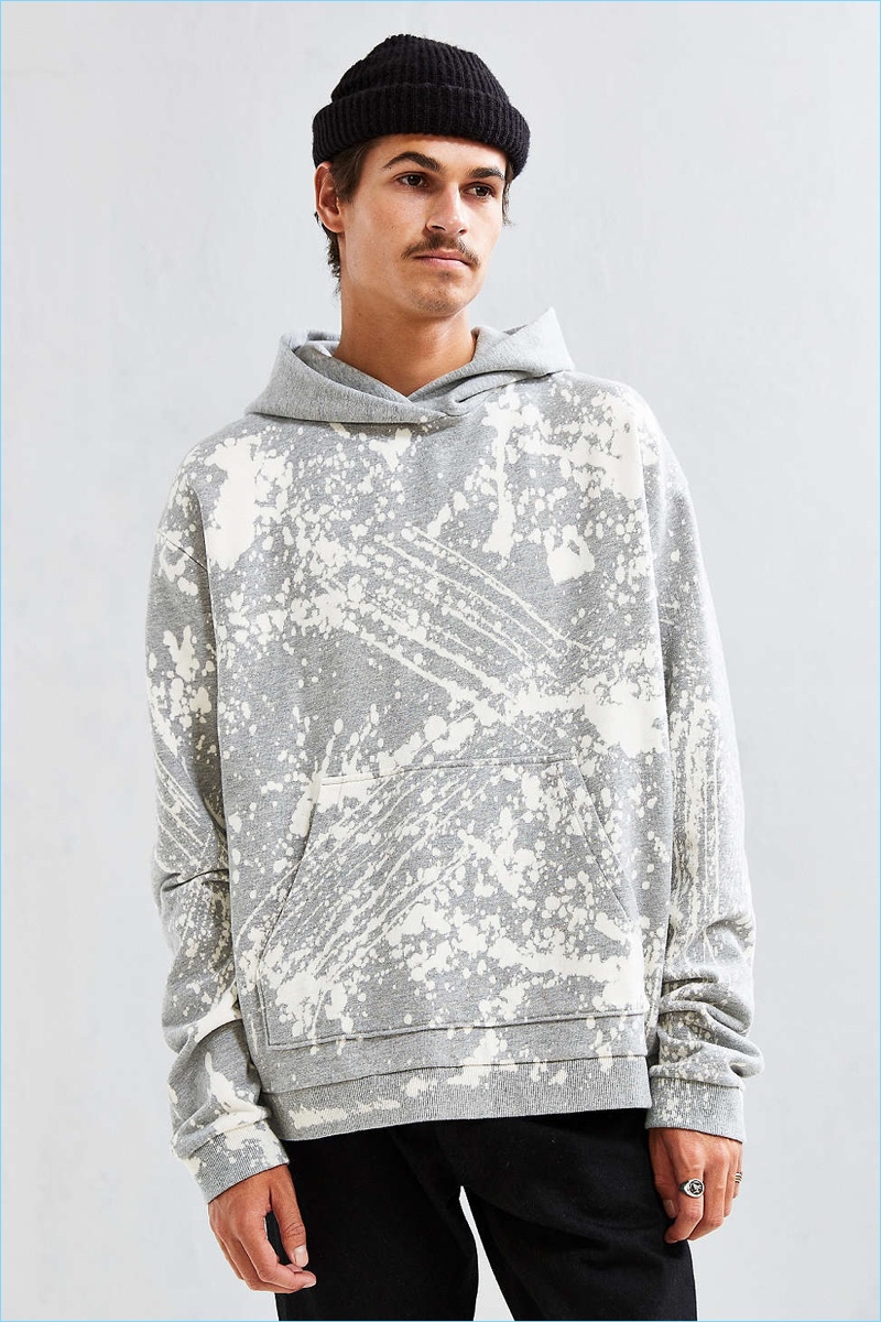 We bleached your favorite hoodie from Urban Outfitters for a prismatic crystal wash finish. Cut in a slightly boxy pullover silhouette offering a fixed hood and front kanga pocket, complete with rib-knit banding at the cuffs + hem for the perfect fit. Each hoodie is customized by hand for a totally unique look -- the one you'll receive will vary slightly in bleach pattern from the photo!