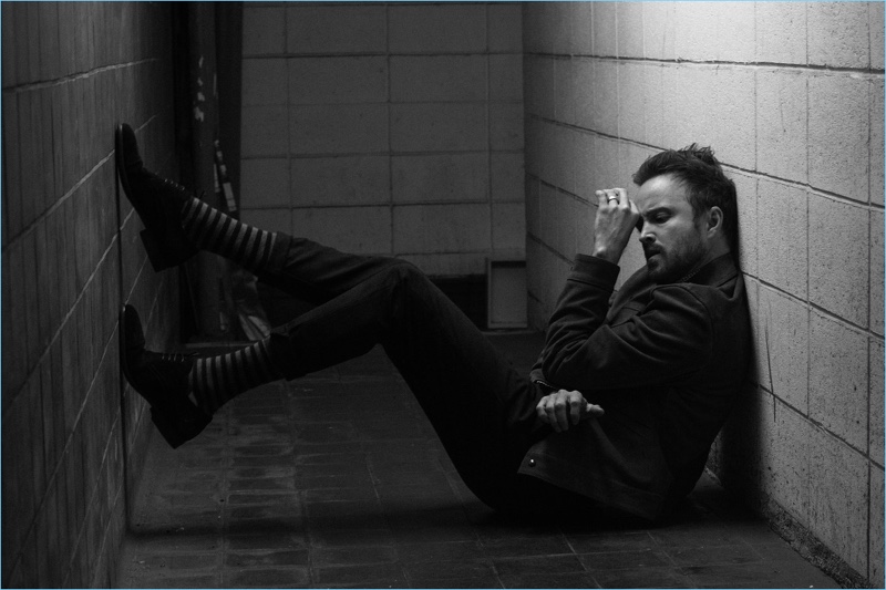 Aaron Paul sports a Sandro jacket, AllSaints pants, and Aquatalia shoes for a photo shoot from The Laterals.